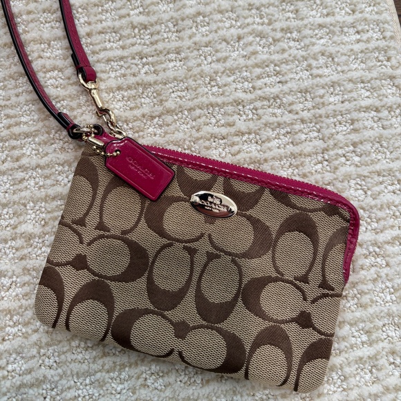 Coach Handbags - Coach Wristlet pink patent leather, tan fabric